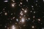 Най-дълбокия галактичен куп бе заснет от Хъбъл