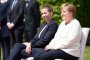 Меркел седнала при химна, за да не трепери
