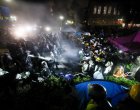 Полицията се сблъсква с пропалестински демонстранти, след като унищожава част от барикадата на лагера в кампуса на Калифорнийския университет на 2 май. Етиен Лоран/AFP/Getty Images