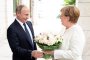     Путин посрещна Меркел с рози