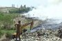 Пожарникари гасят пожар в депото за отпадъци на завода Brahmapuram