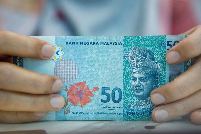 Малайзия ще увеличи разплащанията в местни валути, за да намали