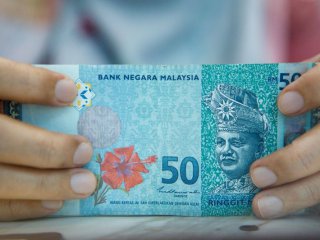 Малайзия ще увеличи разплащанията в местни валути за да намали